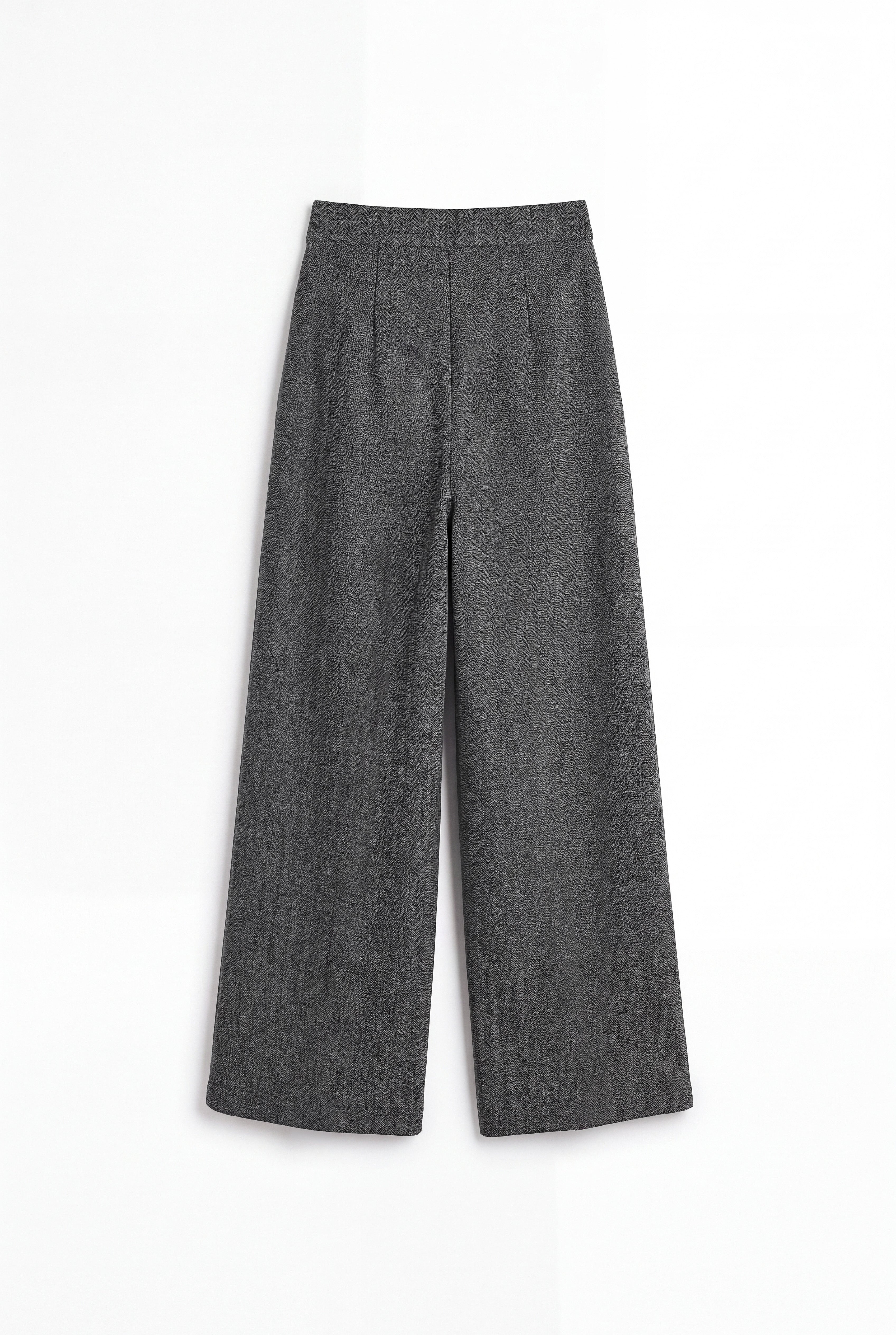 Pantalón gris de punto de espiga con corte holgado para mujer, mostrado de espaldas sobre fondo blanco neutro.