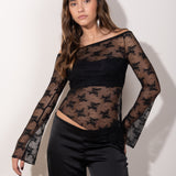 Top de encaje negro manga larga transparente con corte off shoulder y diseño floral. Ideal para tus looks de estas navidades.