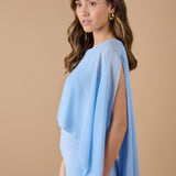  Vestido largo azul celeste asimétrico con detalle de pañuelo en el hombro y ajuste ceñido, ideal para invitadas elegantes y eventos especiales - Closet.bcn